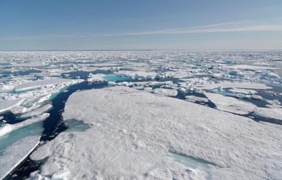 Broken pieces of Arctic sea ice north of Svalbard, Norway.