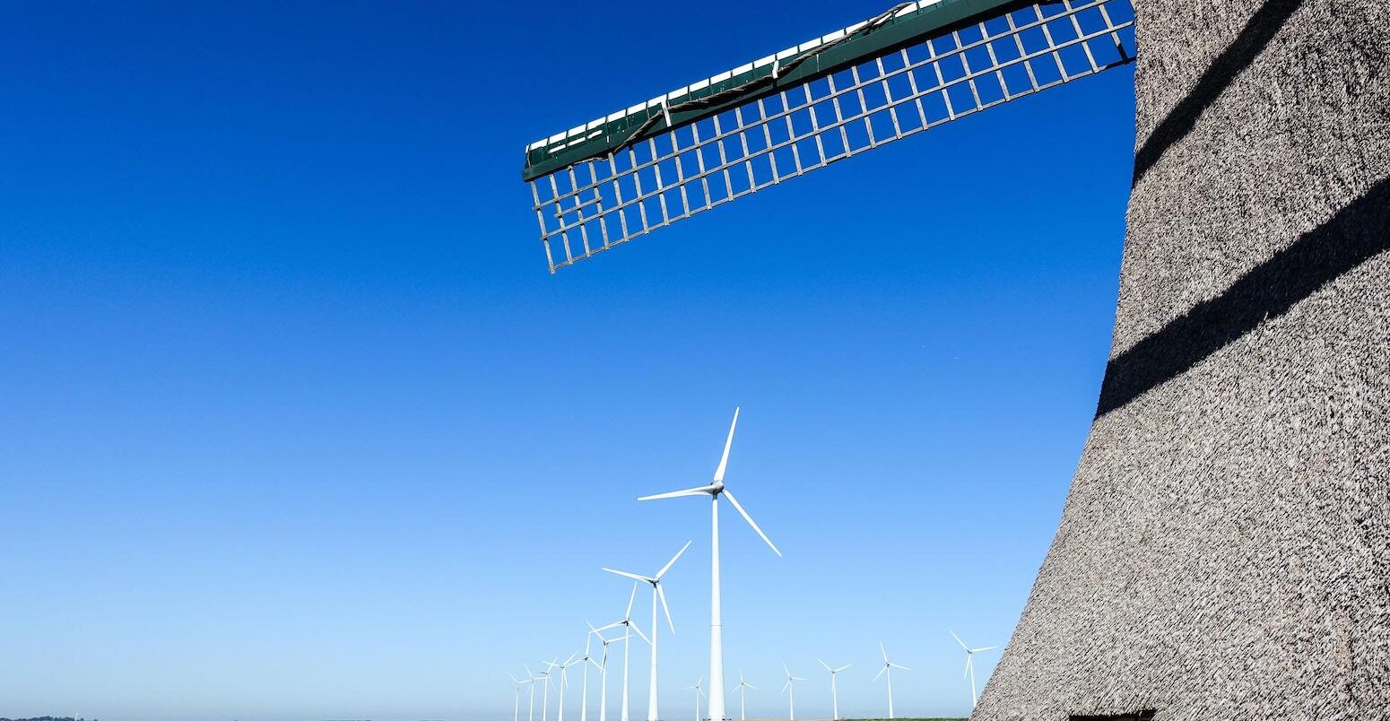 Old windmills and newer wind turbines, Netherlands.