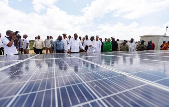 Kenyan President Uhuru Kenyatta C attends the launching ceremony of a solar farm in Garissa, Kenya, 2019.