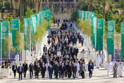 World Heads of States walk down Al Wasl avenue after their group photo during the UN Climate Change Conference COP28 at Expo City Dubai on December 1, 2023, in Dubai, United Arab Emirates.