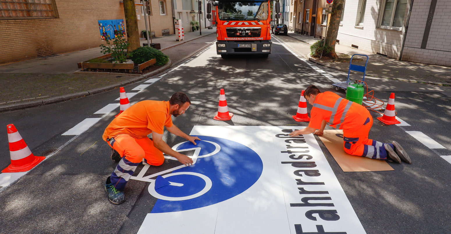 Application of new bicycle pictograms. Essen, Germany.