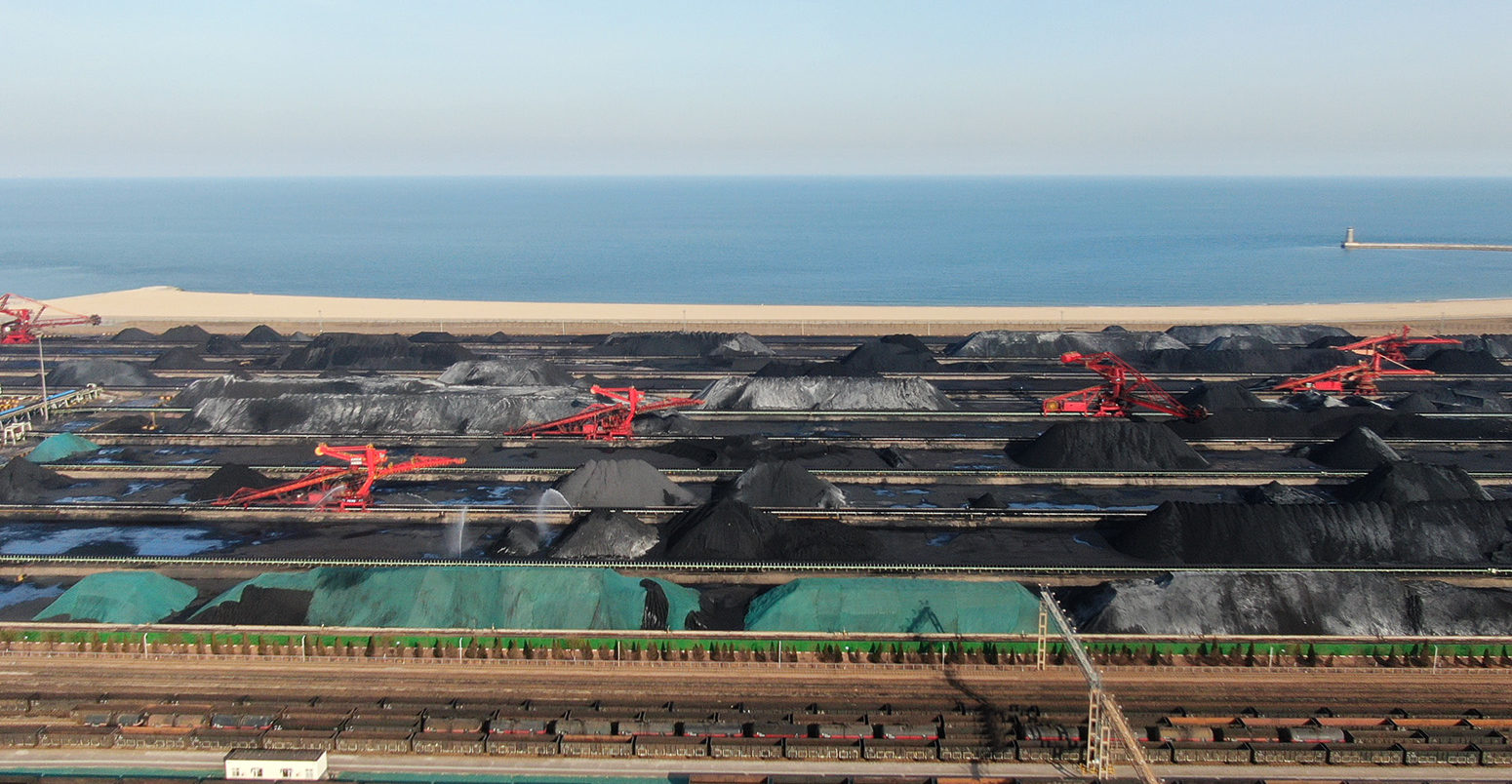 Drone picture showing a coal yard at a port in Rizhao city of Shandong province, northern China, on 2 February 2022. Credit: Oriental Image