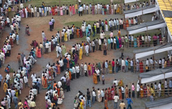 Voting queue at election polling station, Mumbai, India. Image ID: DH36MY. Credit: Dinodia Photos / Alamy Stock Photo.