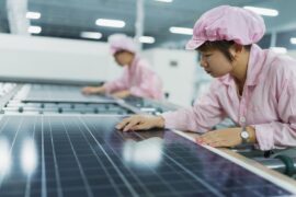 Female workers in solar panel assembly factory, Solar Valley, Dezhou, China.