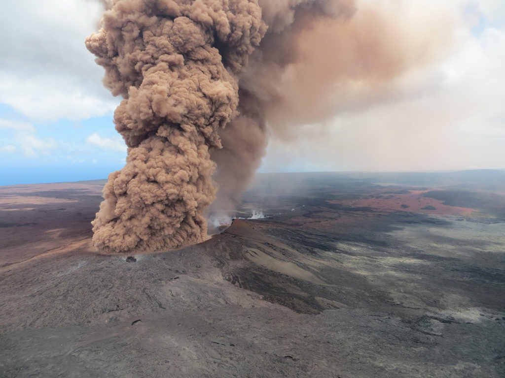 Volcanic plume rises from the Kilauea volcano following a 6.9-magnitude earthquake 4 May 2018 in Leilani Estates, Hawaii. Credit: Planetpix / Alamy Stock Photo. MKTG41