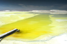 A pond to extract lithium from salt in Atacama Desert, North of Chile. Credit: Diego Giudice / Alamy Stock Photo. BNKX1X