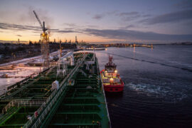 An oil tanker being moored at the Mongstad oil terminal and refinery in Norway. Credit: Ola Moen / Alamy Stock Photo. D1AJ6D