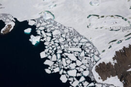 Floating ice breaking away from Holl Island, Antarctica.